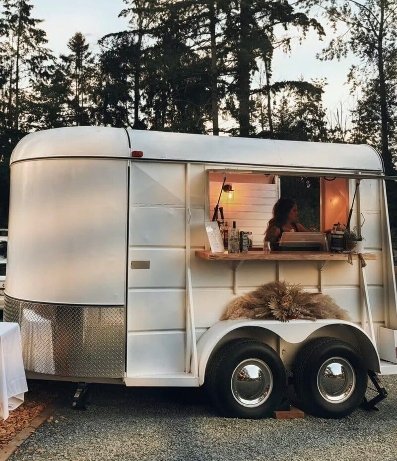 West Coast Street Saloon's converted horse-trailer bar at dusk