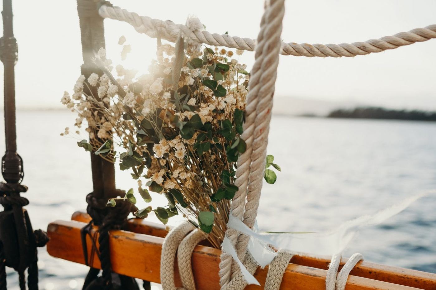 flowers from Salt Spring Island Wedding Florists shine in sunset light.