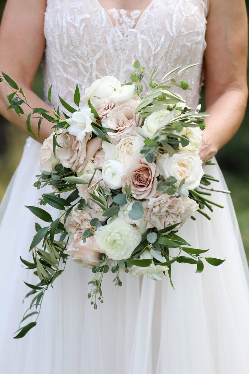 Bride holding bouquet of flowers at her Sooke wedding 