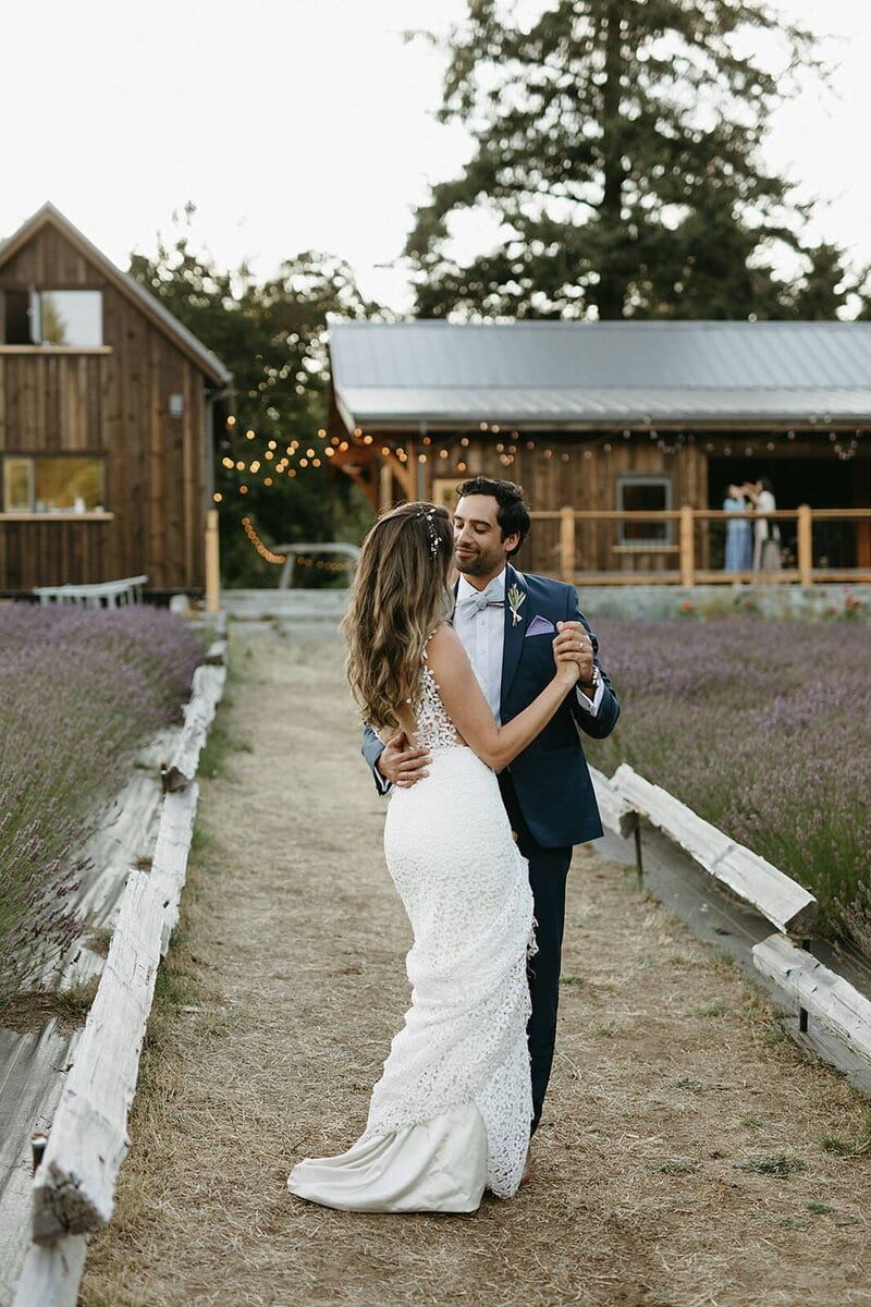 Couple dancing between lavender rows at Bilston Creek Farm