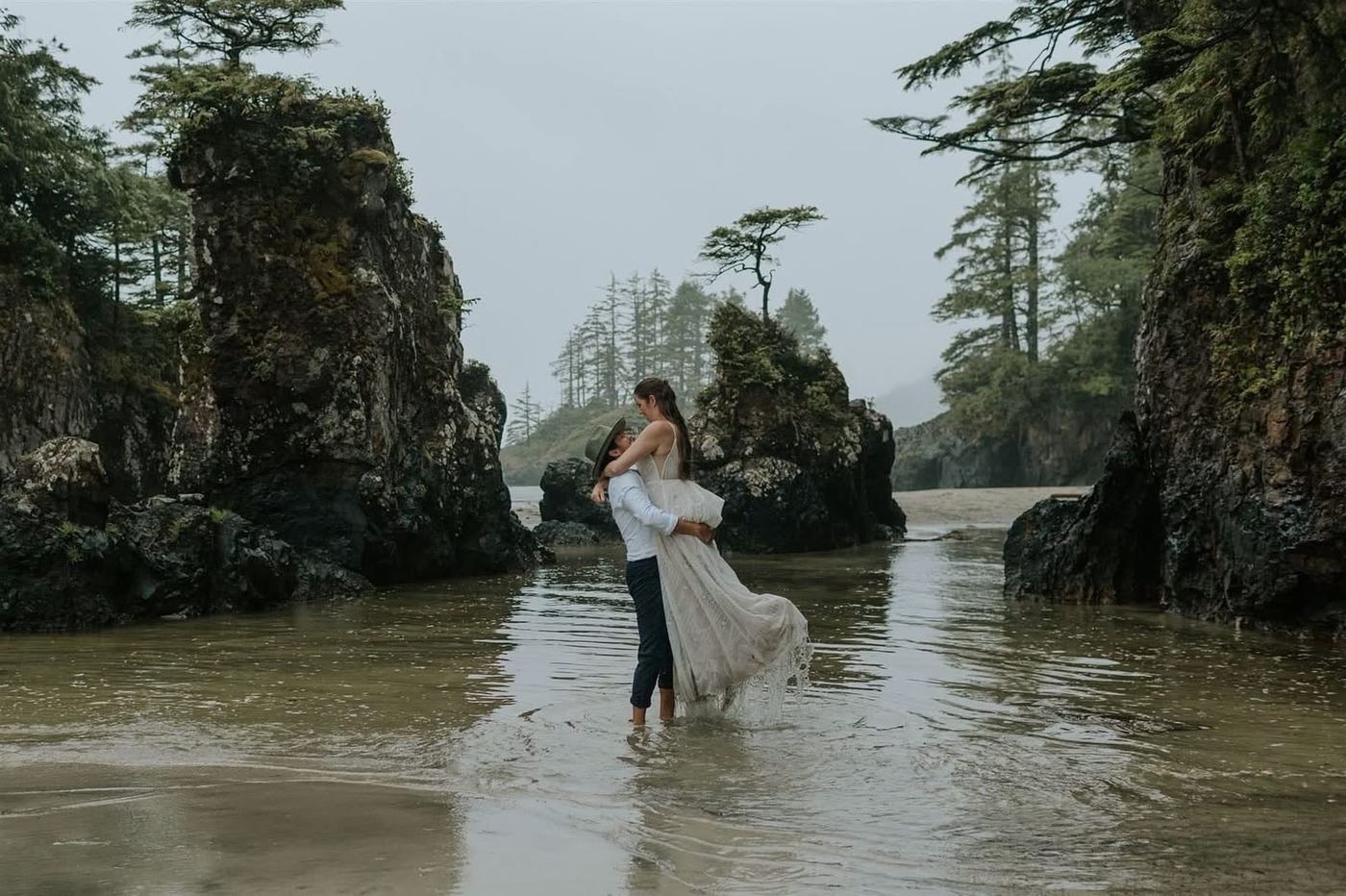 couple posing on beach for Vancouver Island wedding photographer